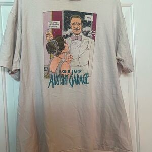 Hanes Beige Graphic Tee with Teal & Pink Comic Print fits like Men’s L